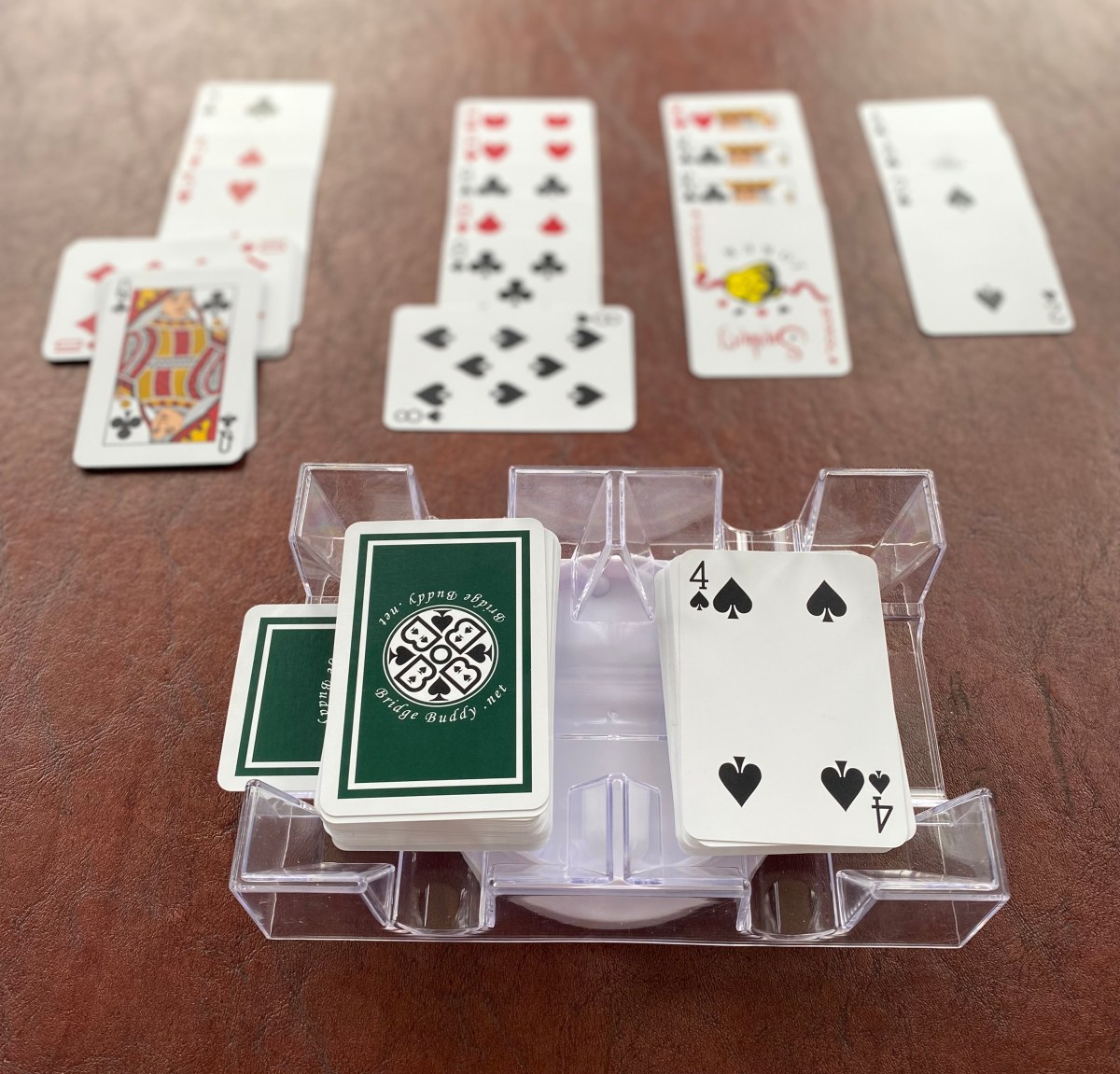Canasta cards and card tray on a playing table